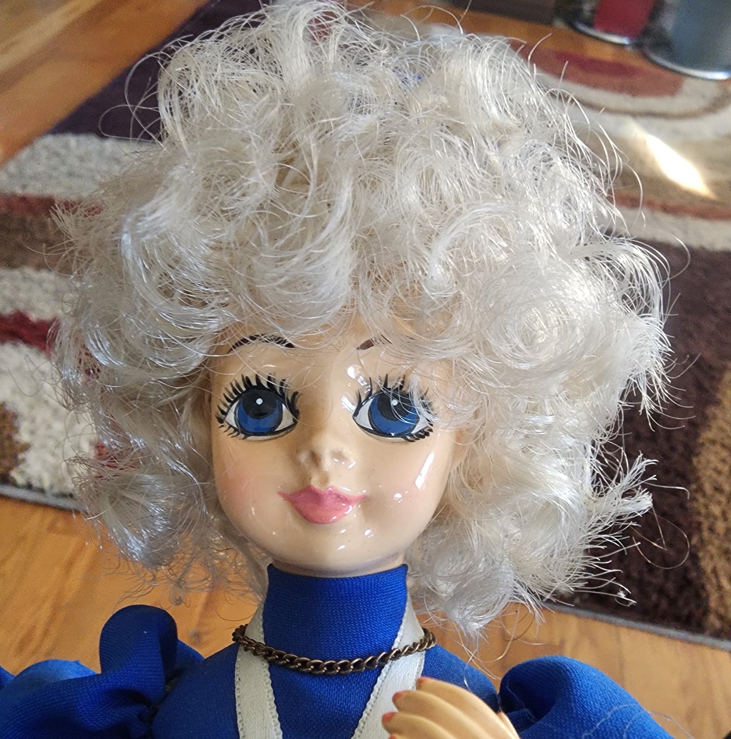 Collectible 1986 Brinn's Musical July Calendar Doll.