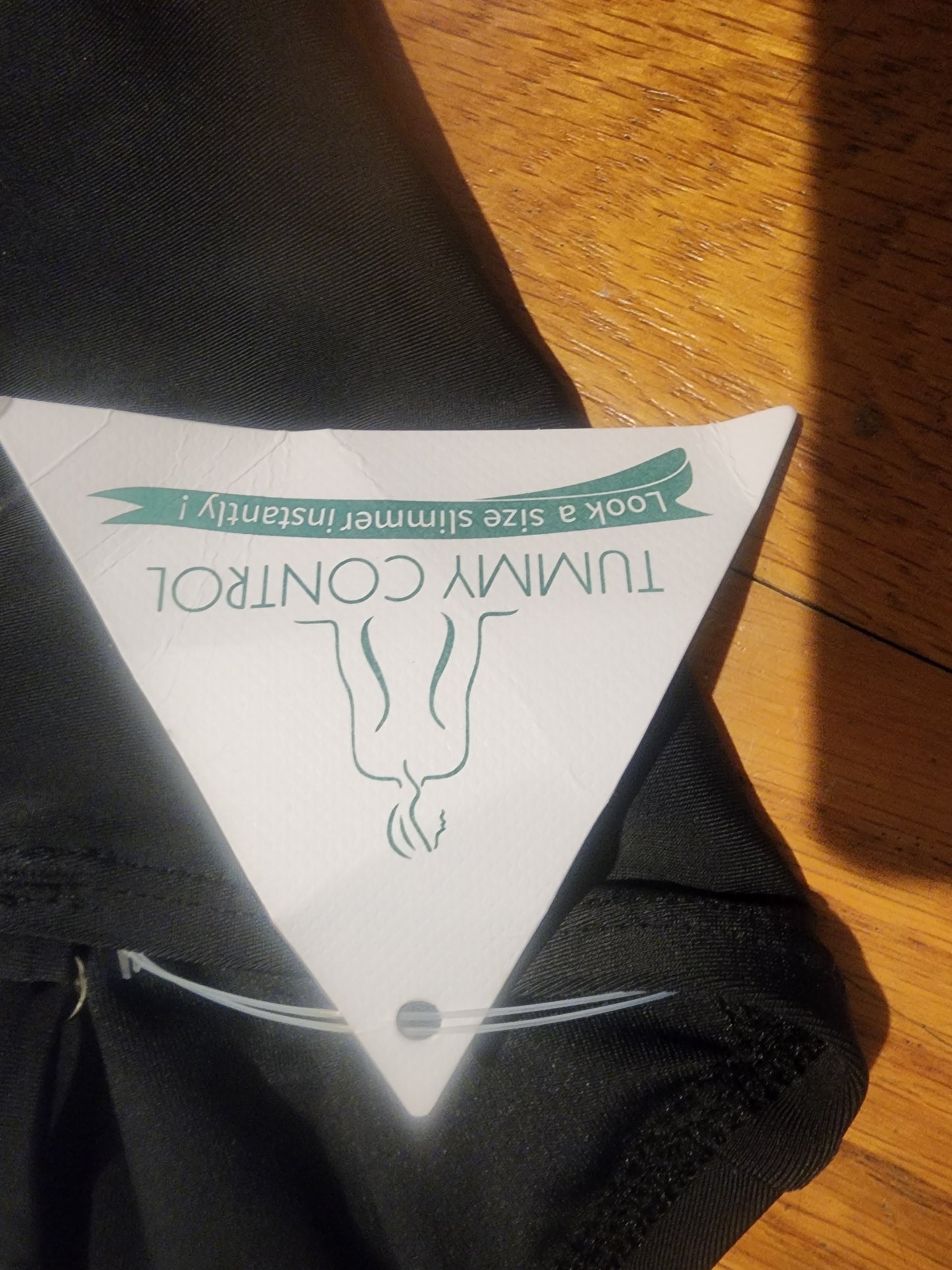 Slimming Black One-Piece Swimsuit (L/10) - Brand new, never worn.