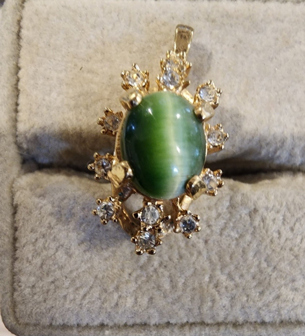 Elegant Pendent with Green Tigers eye gemstone accented with sparking clear stone