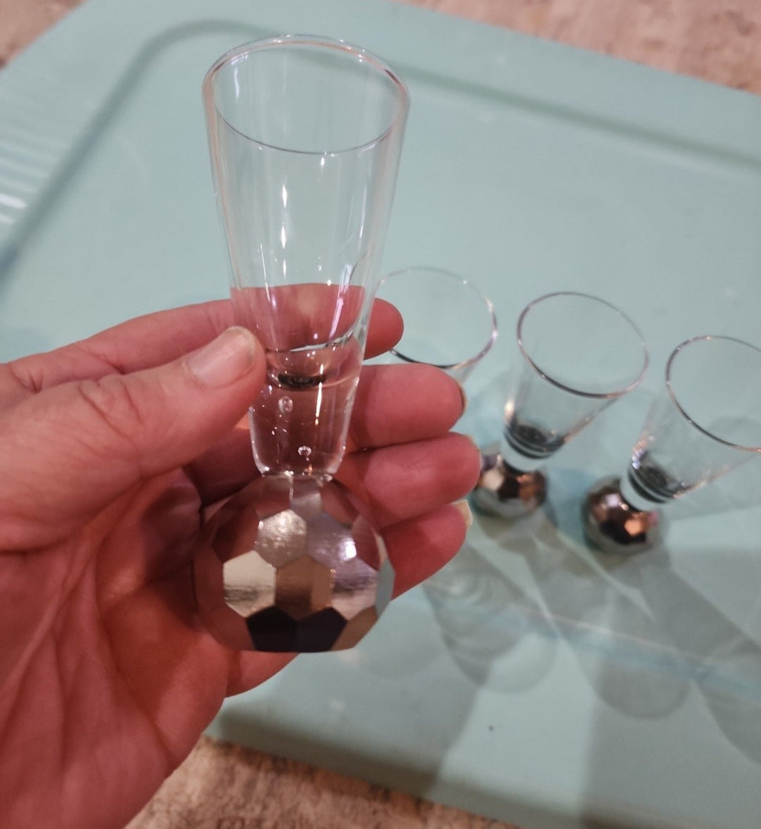 Set of 4 Elegant Shot Glasses with dark silver faceted base