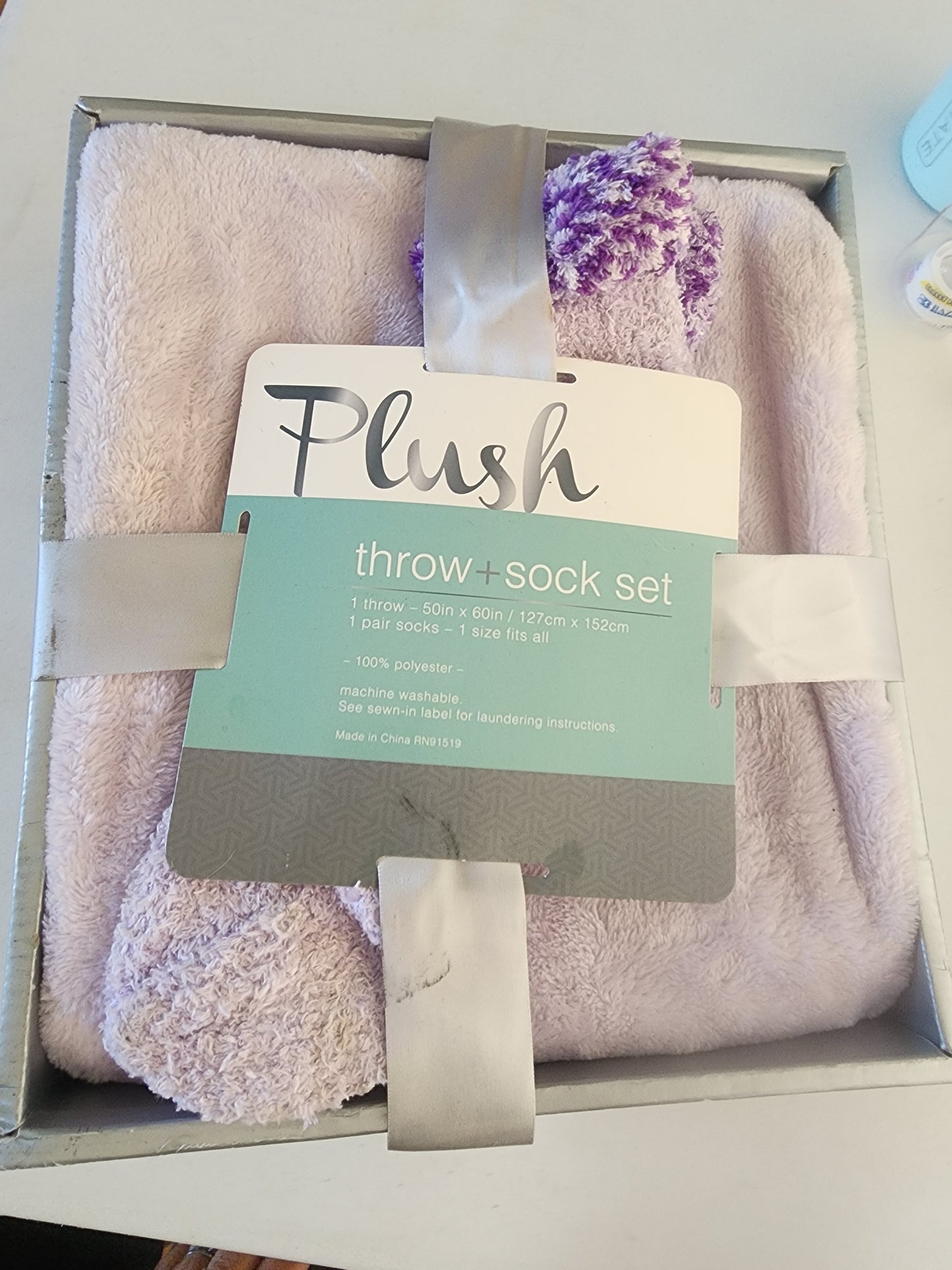 Light Purple plush throw with matching sock set.