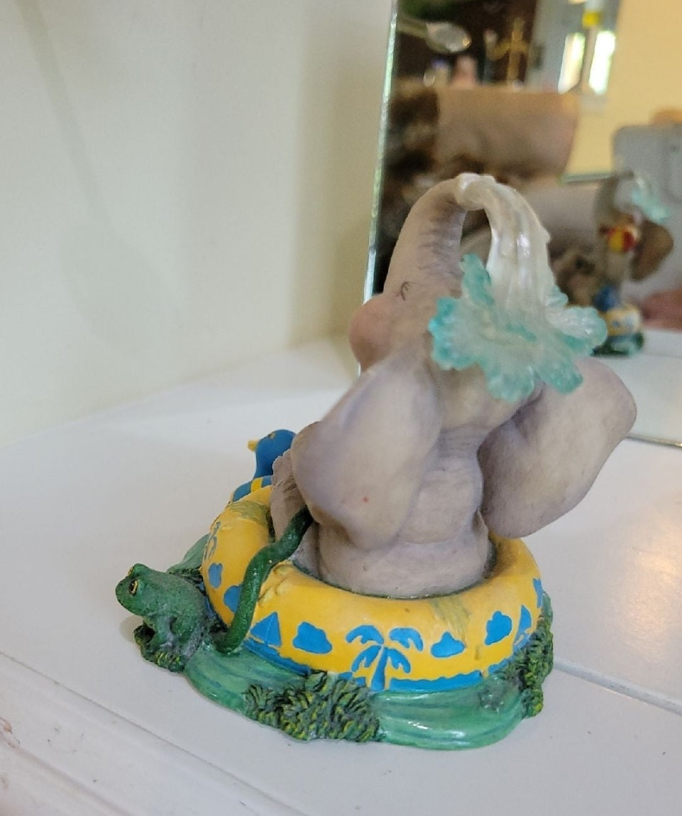 Elephant Having a Ball figurine sitting in a pool. By Hamilton Collection Peanut