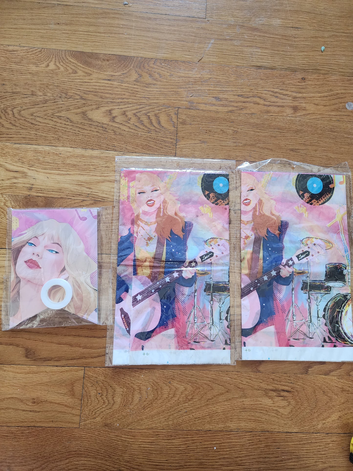 2 Taylor Swift plastic table cloths and a matching flag banner for party
