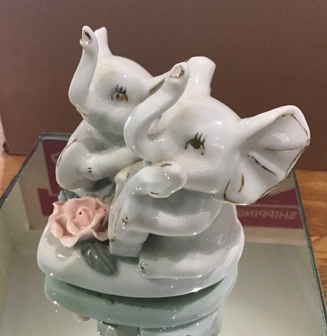 Vintage Victorian 2 sets of Porcelain Elephants on heart base with rose accents