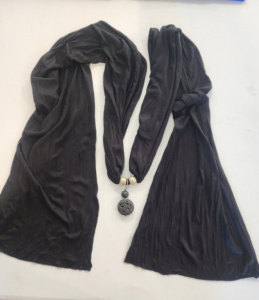 <span;>Black scarf with silver tone beads and black lava bead in middle of scarf.