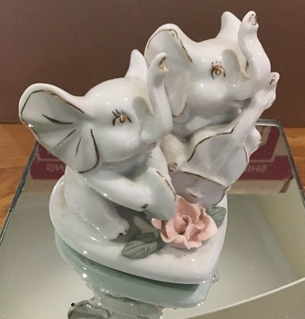 Vintage Victorian 2 sets of Porcelain Elephants on heart base with rose accents