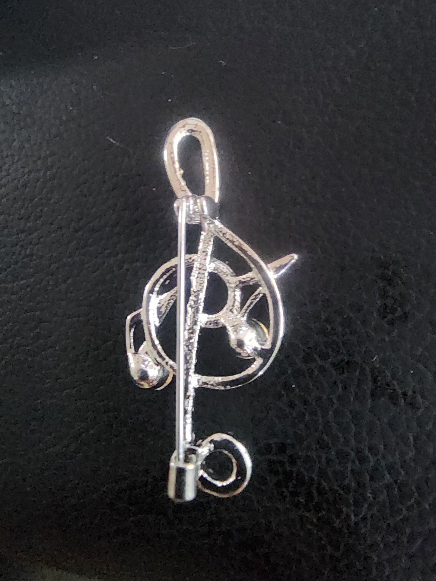 Sparkling Musical Elegance: Rhinestone Treble Clef Brooch