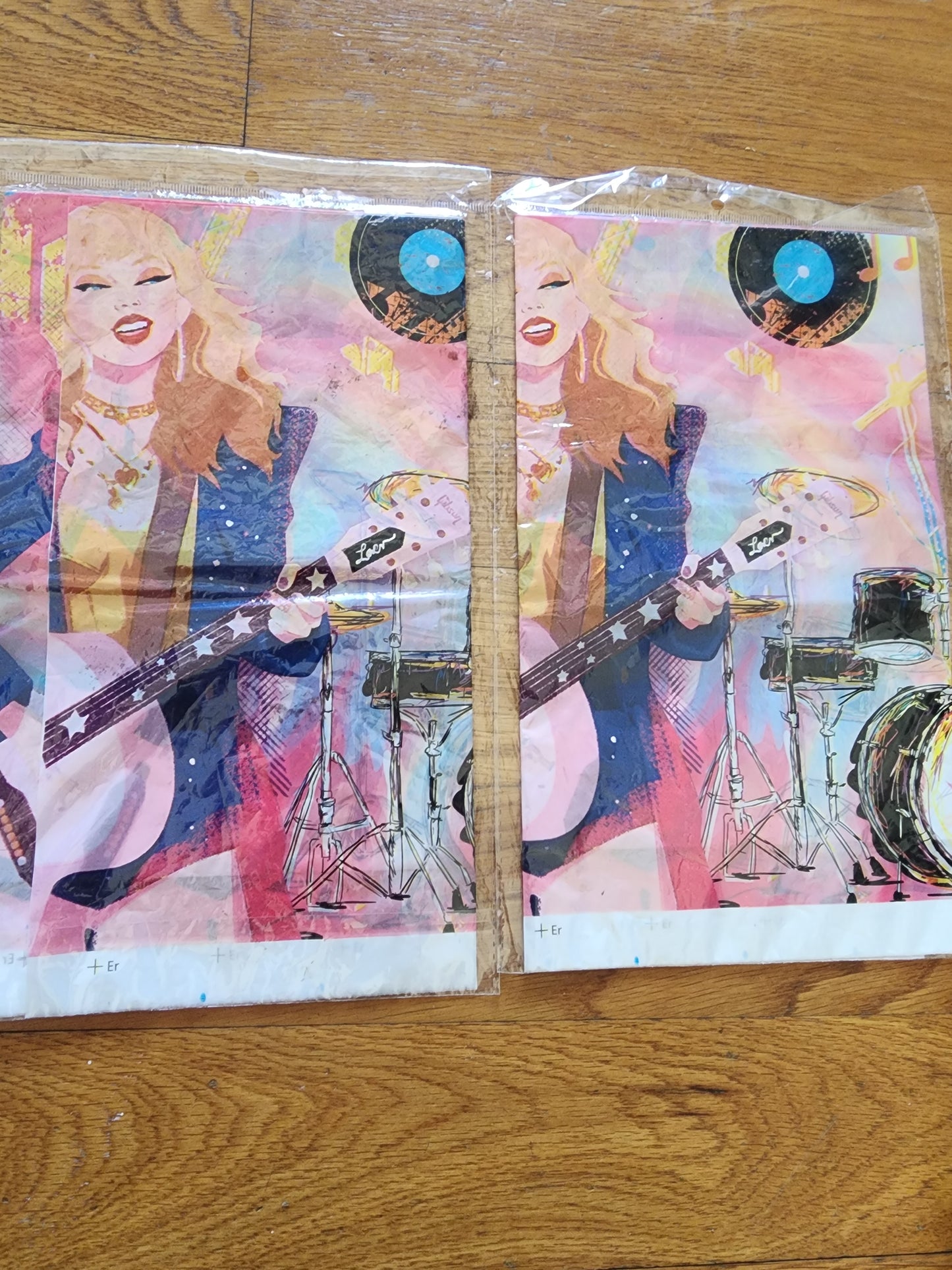 2 Taylor Swift plastic table cloths and a matching flag banner for party