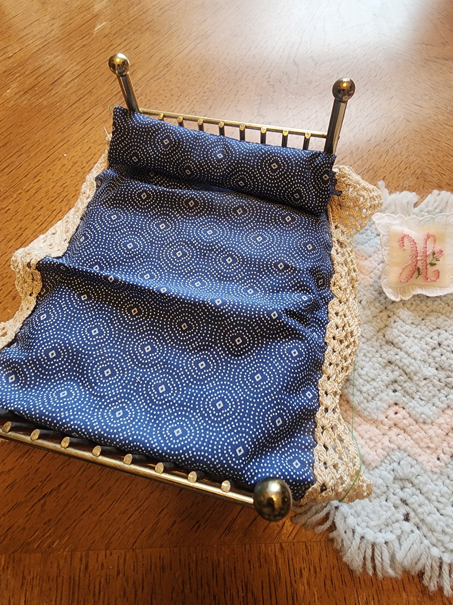 Brass Bed for Dollhouse includes, mattress,  pillows and blankets.