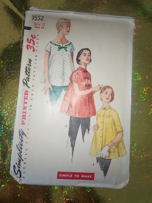 Vintage Simplicity sewing pattern 1552 for maternity blouses from the 1950's, in size 12, bust 30 inches.