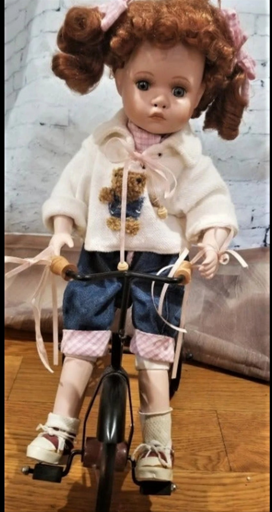 Adorable Porcelain Red-Headed Molly Doll with Teddy Bear on tricycle by Geppeddo