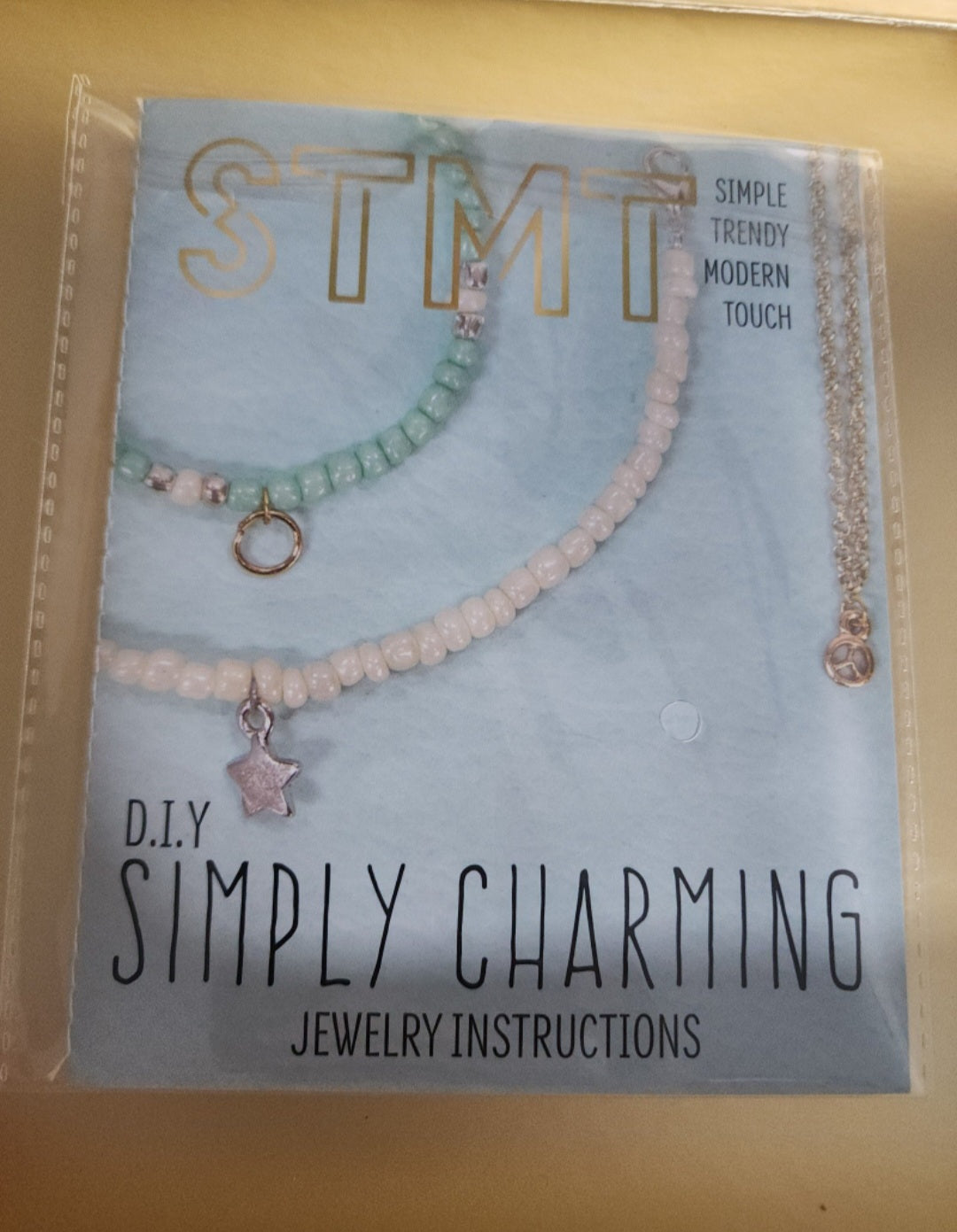 STMT DIY Jewelry kit as shown in photo with beads and charms.