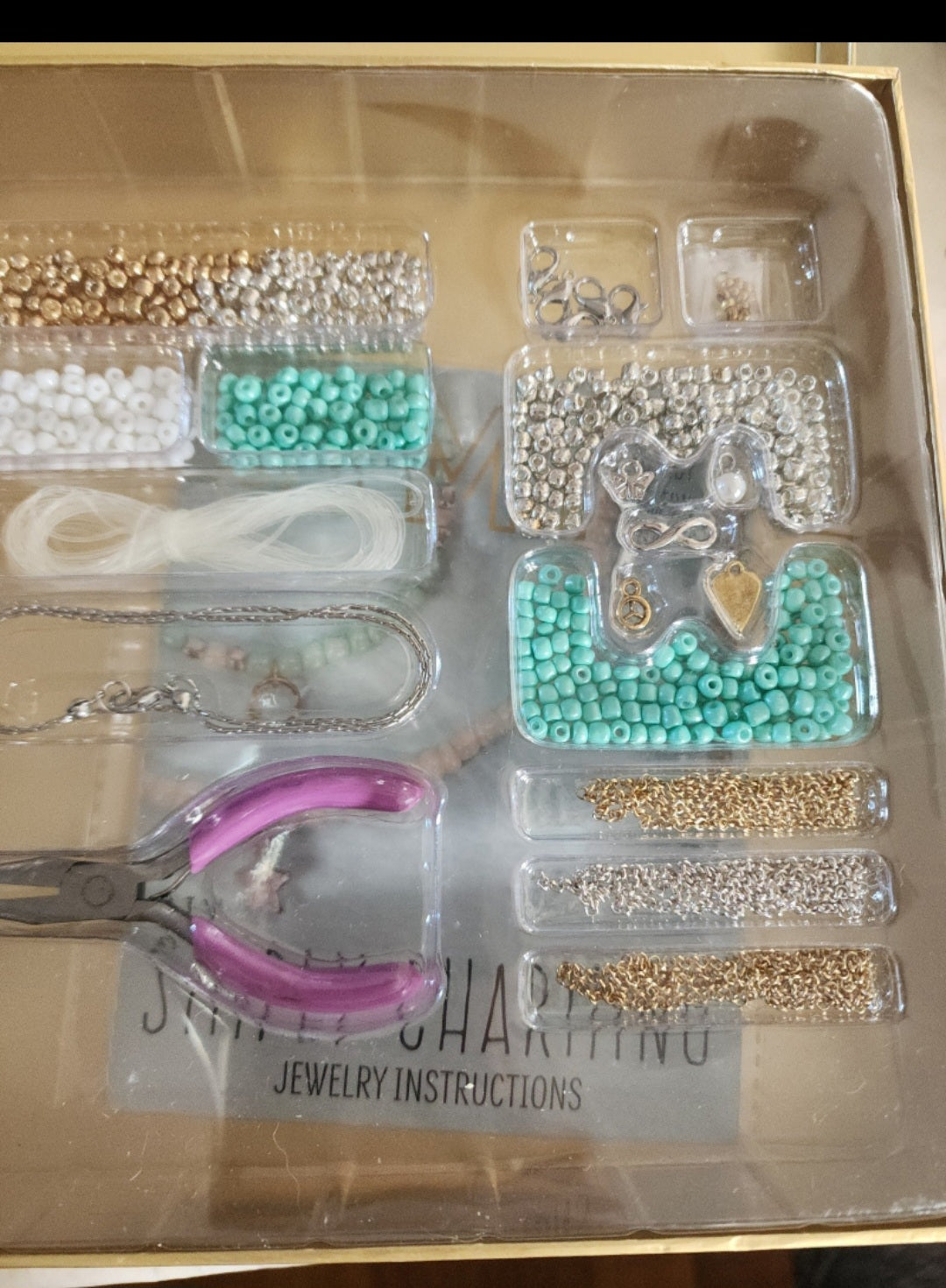 STMT DIY Jewelry kit as shown in photo with beads and charms.