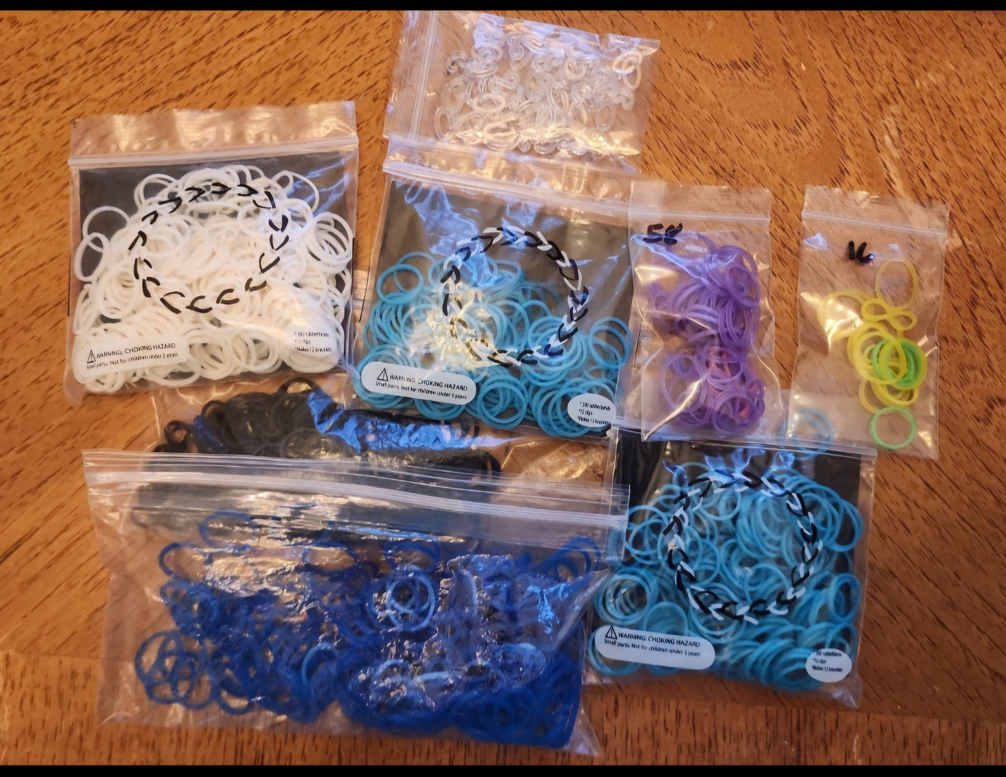 RAINBOW loom lot with c & s clips. Blue turquoise,  purple white black