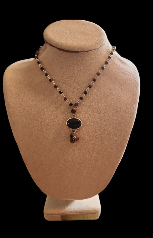 NY necklace with gold tone Accents and brown Beads