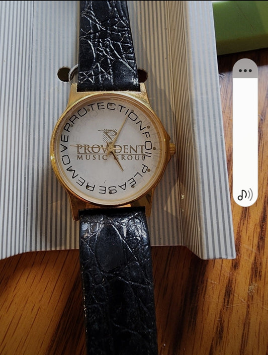 Provident Music Group Watch Gold Tone Watch with leather band