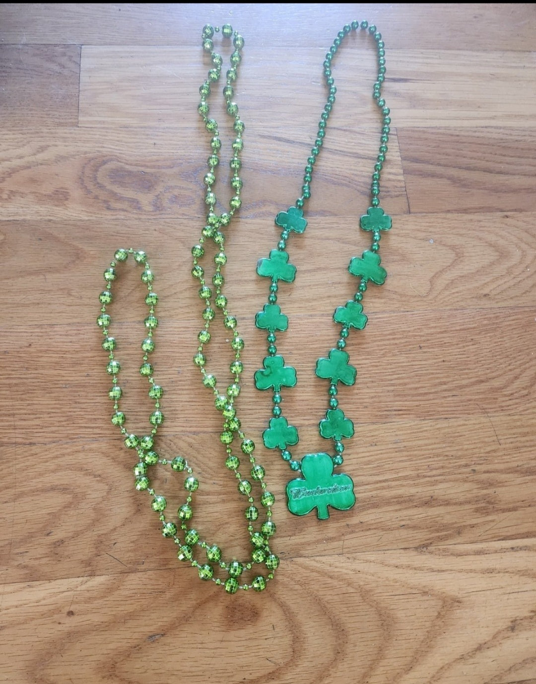 2 Green Mardi Gras Beads one Shamrocks says Budweiser and disco balls