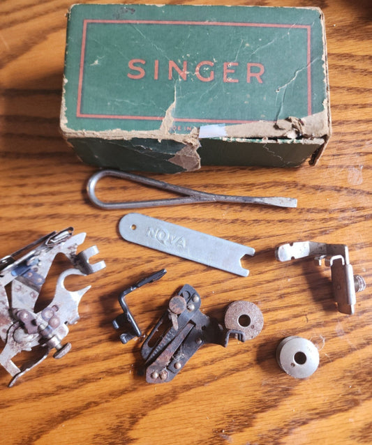 Vintage Singer Sewing Machine Attachments.