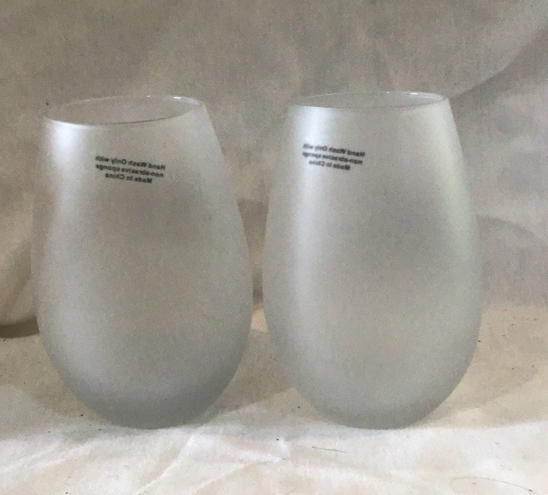 Two  Frosty wine glasses Drinks well with Others, wine taste better with friends