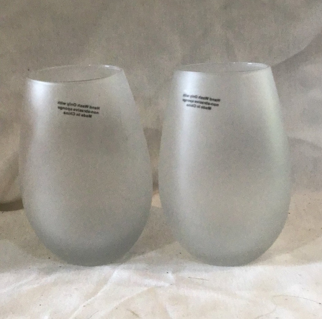 Two  Frosty wine glasses Drinks well with Others, wine taste better with friends