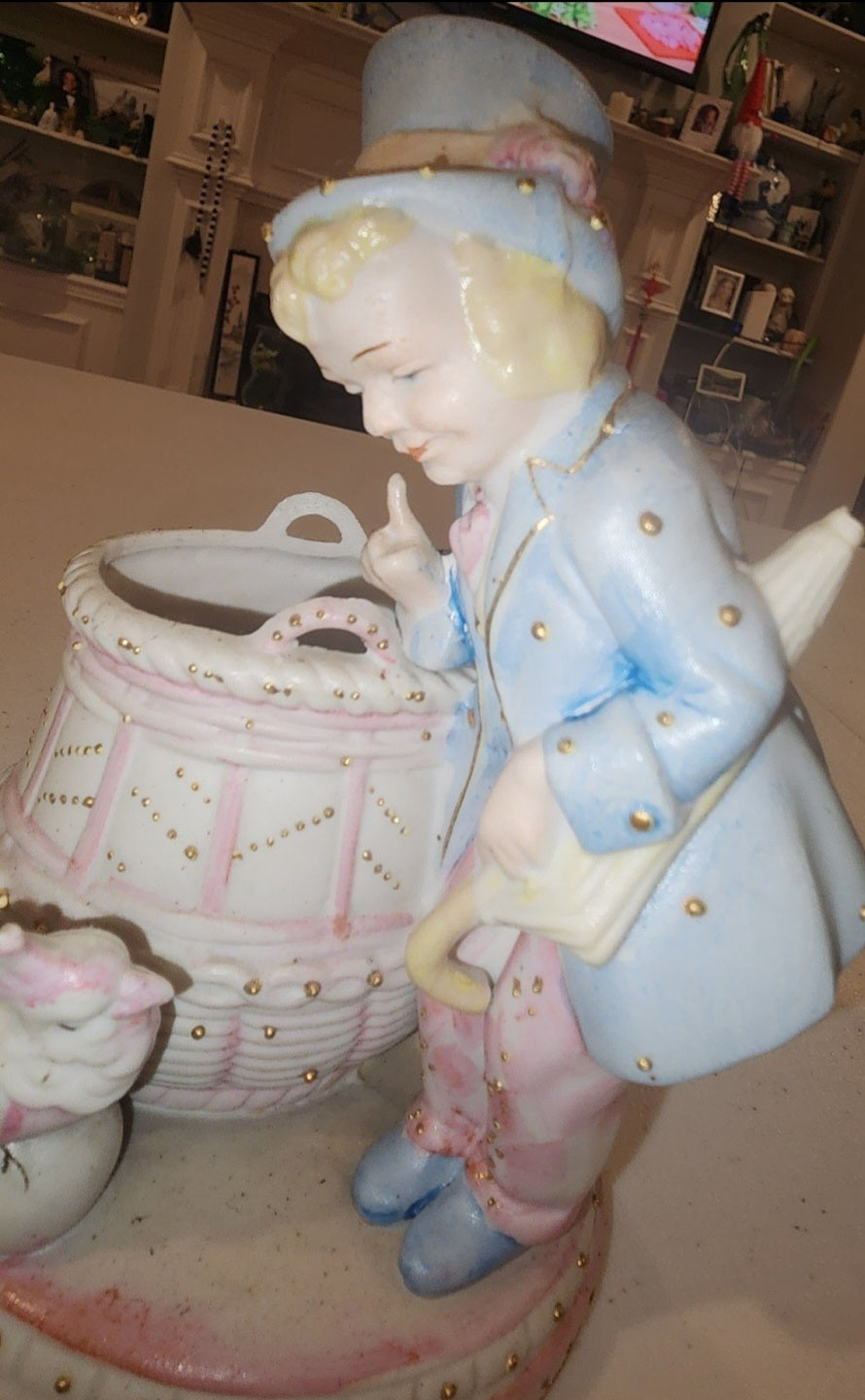 Occupied Japan Paul Ux Victorian Boy w Cockatoo and basket in pink blue and Gold