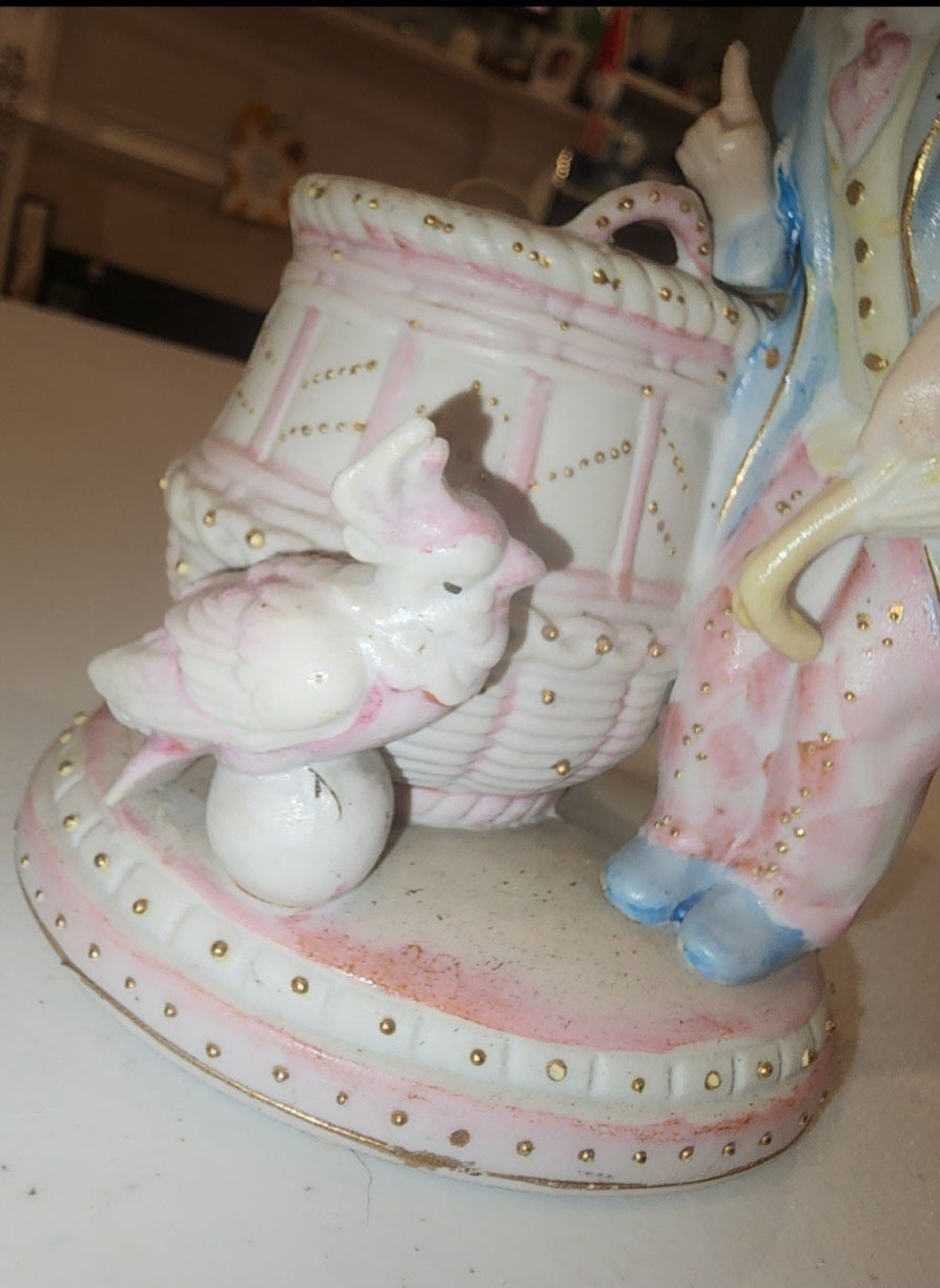 Occupied Japan Paul Ux Victorian Boy w Cockatoo and basket in pink blue and Gold