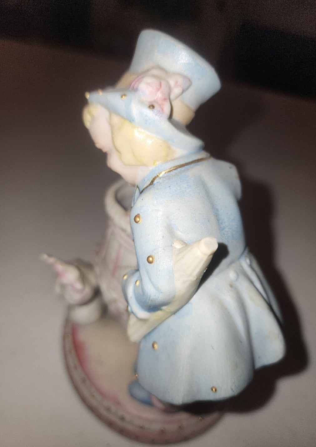 Occupied Japan Paul Ux Victorian Boy w Cockatoo and basket in pink blue and Gold