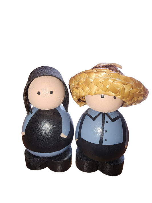 2 wooden amish figurines