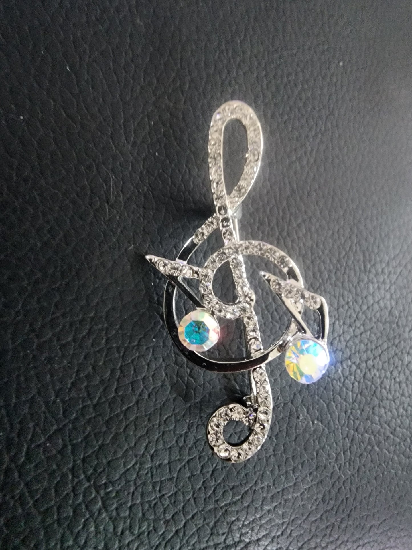 Sparkling Musical Elegance: Rhinestone Treble Clef Brooch