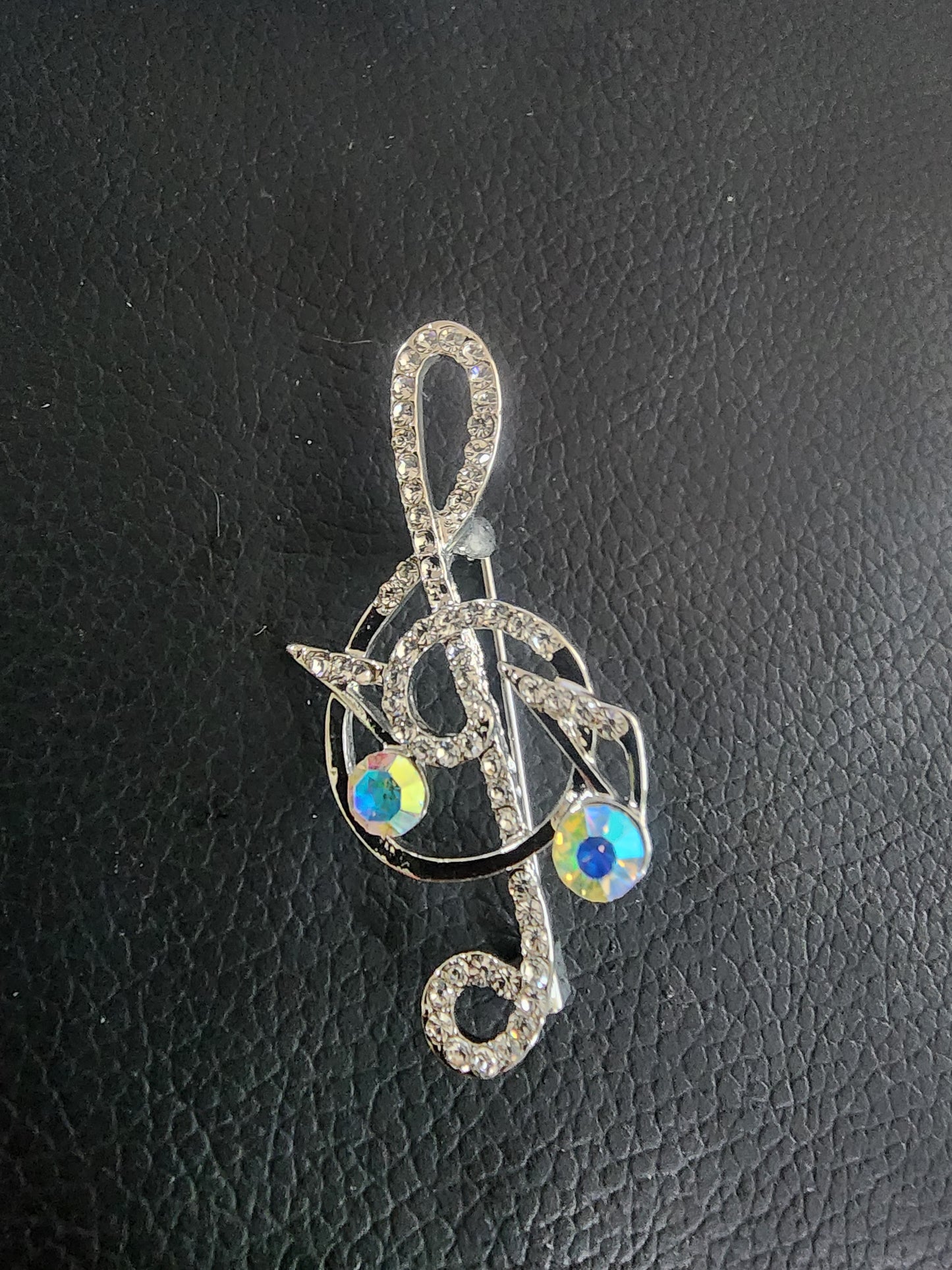 Sparkling Musical Elegance: Rhinestone Treble Clef Brooch