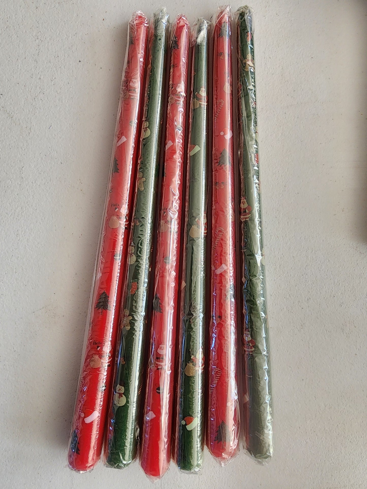New 12 Christmas 12" taper Candles 6 Red & 6 Green with snowmen. Santa's, Christmas Trees & peppermint.