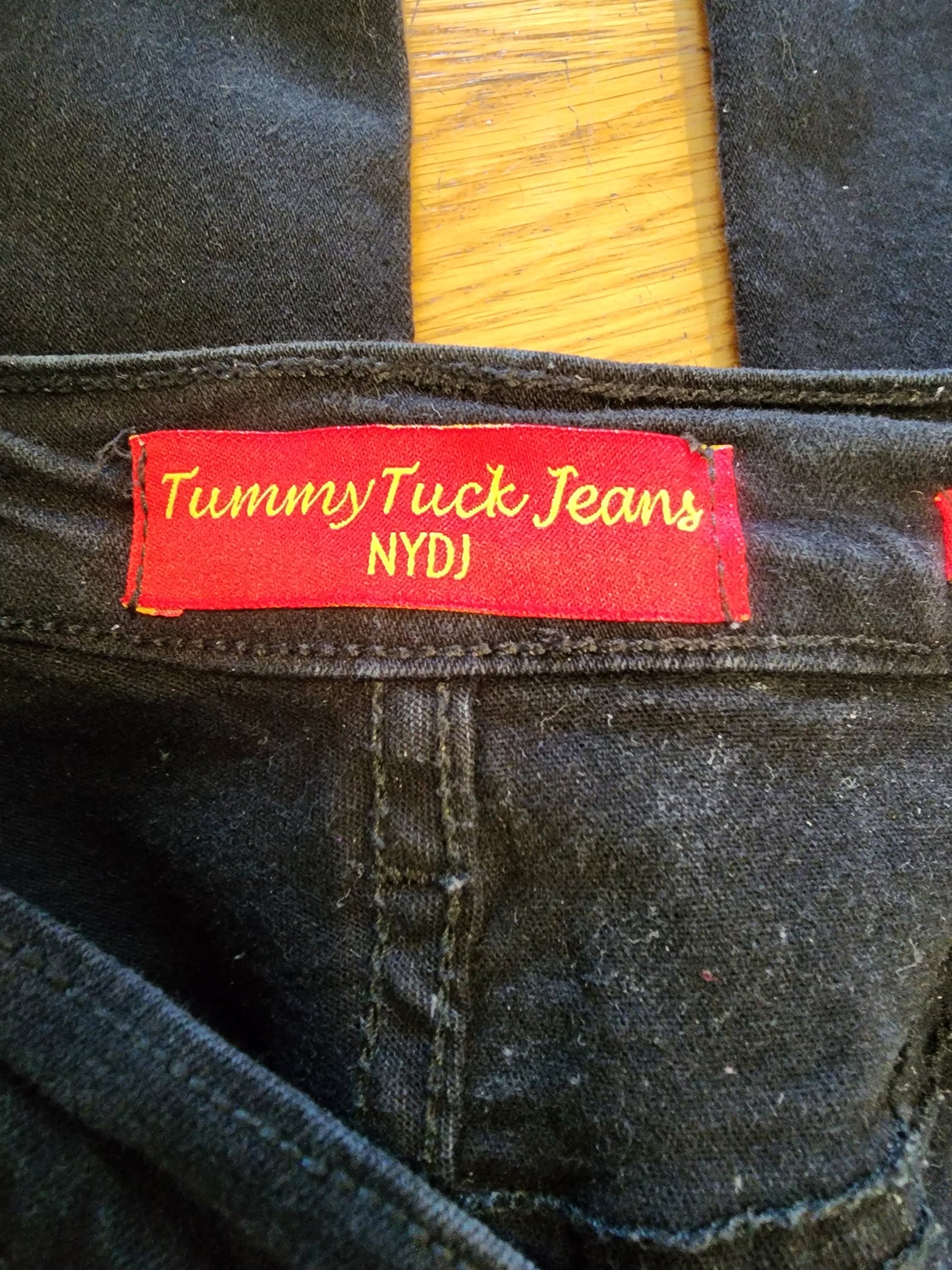 Black Jeans with diamond like studs 6 by NYDJ tummy tuck Jeans