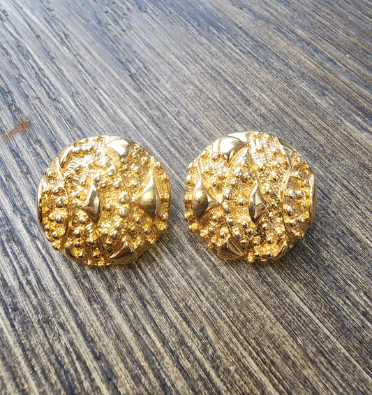 Vintage Sarah Coventry Gold Tone Textured Clip-On Earrings. Button style with a unique nugget texture. Excellent condition."