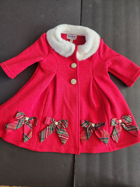 This is an adorable, festive infant girl's light coat 9 months