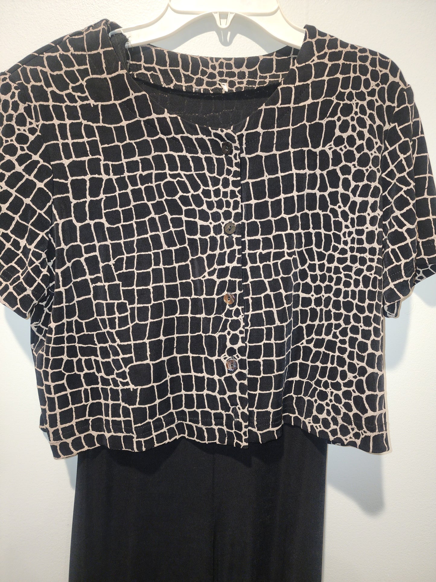 Black maxi dress paired with a short-sleeved top featuring a Giraffe Pattern M