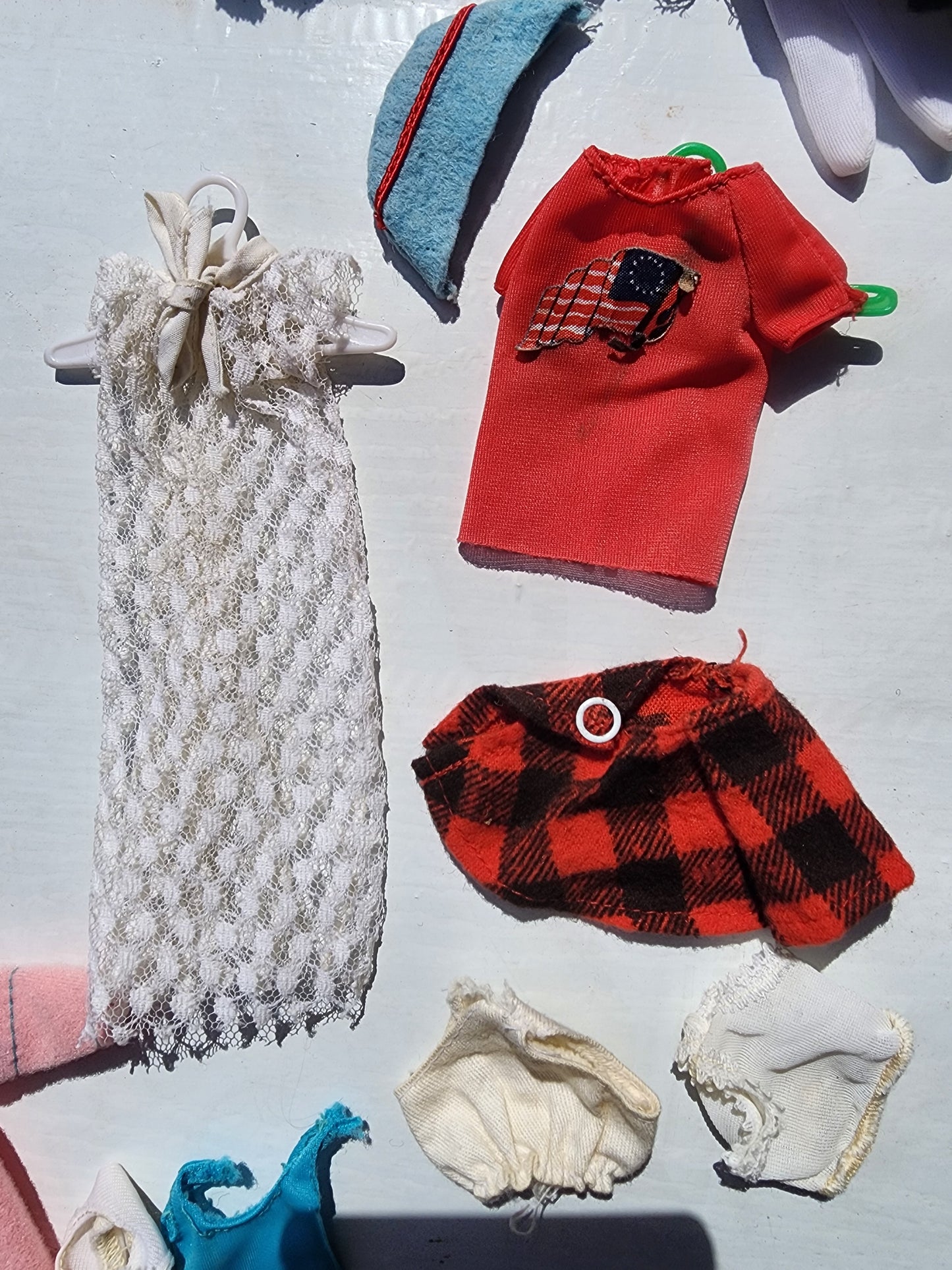 Small Vintage doll clothes aprox. 25 pieces with hangers