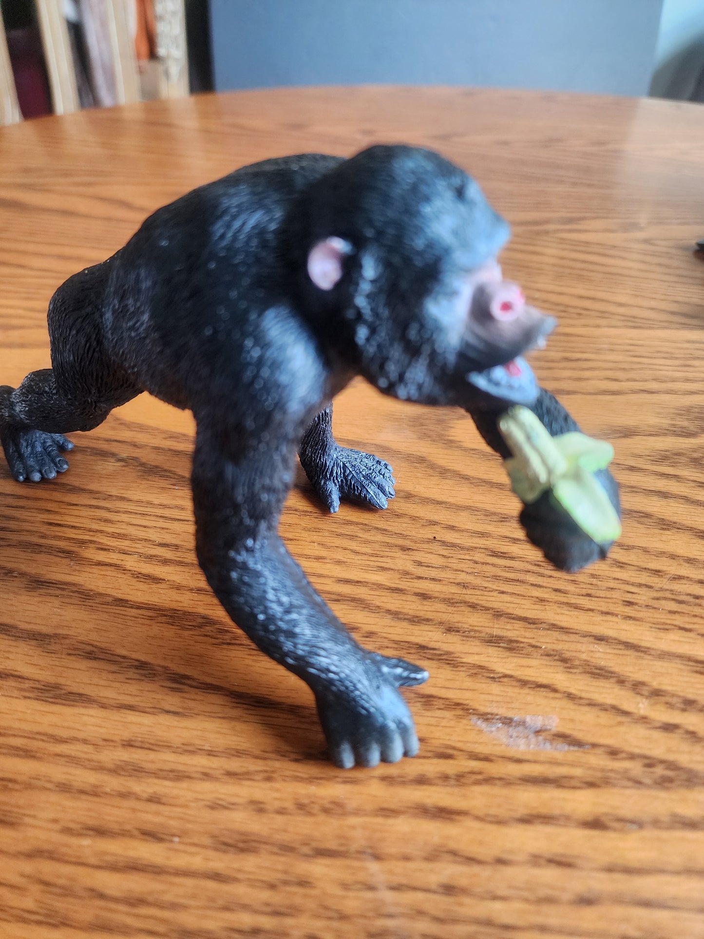 Chimpanzee with Banana – Realistic Wildlife Figurine