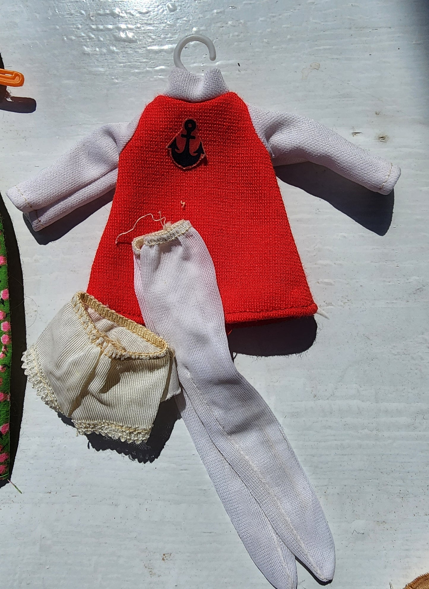 Small Vintage doll clothes aprox. 25 pieces with hangers