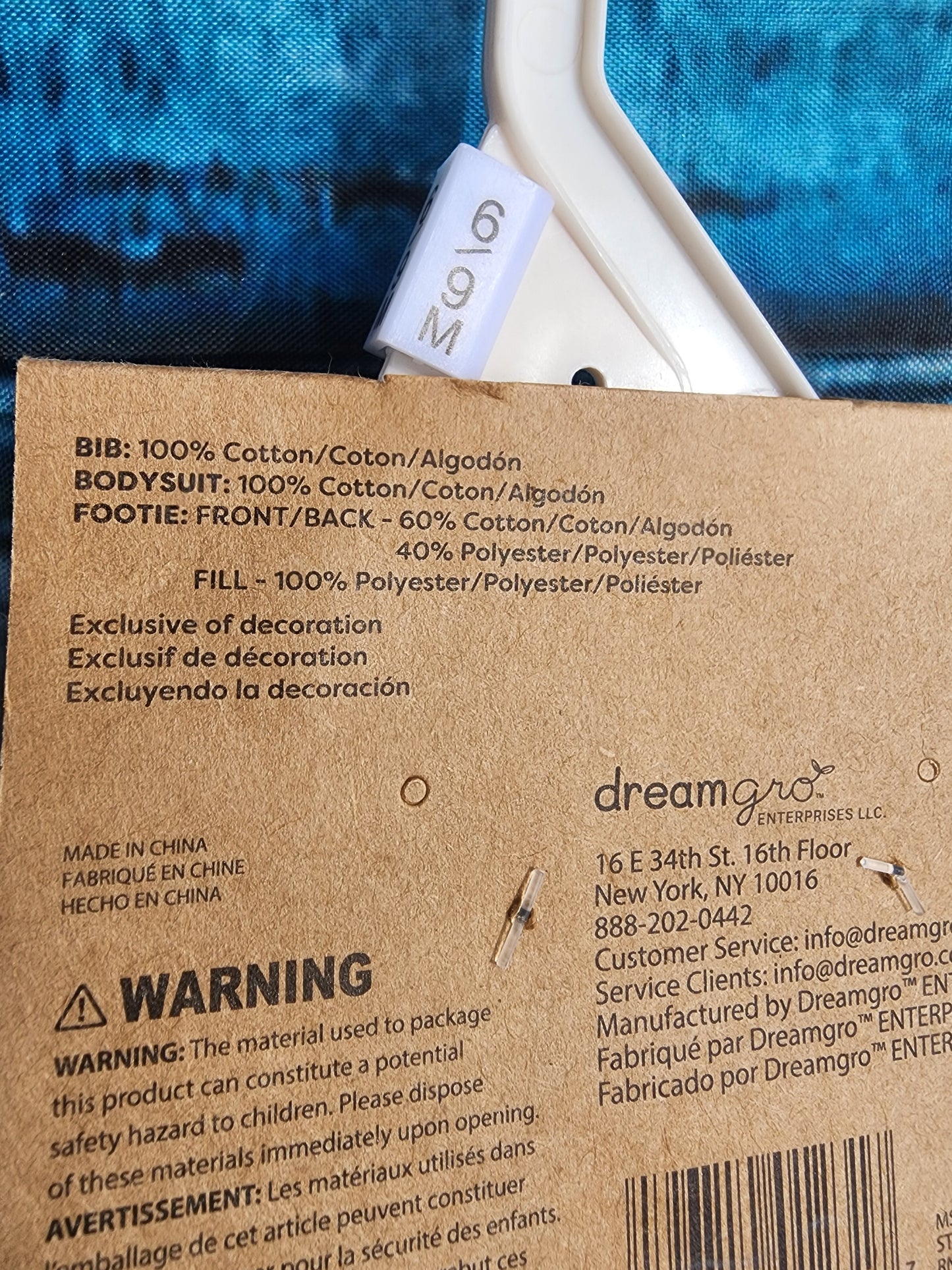 Dreamgro 3-piece baby outfit set. Includes a long-sleeved quilted footie, a short-sleeved bodysuit with bear print, and a "So Beary Cute!" bib. Size 6-9 months.