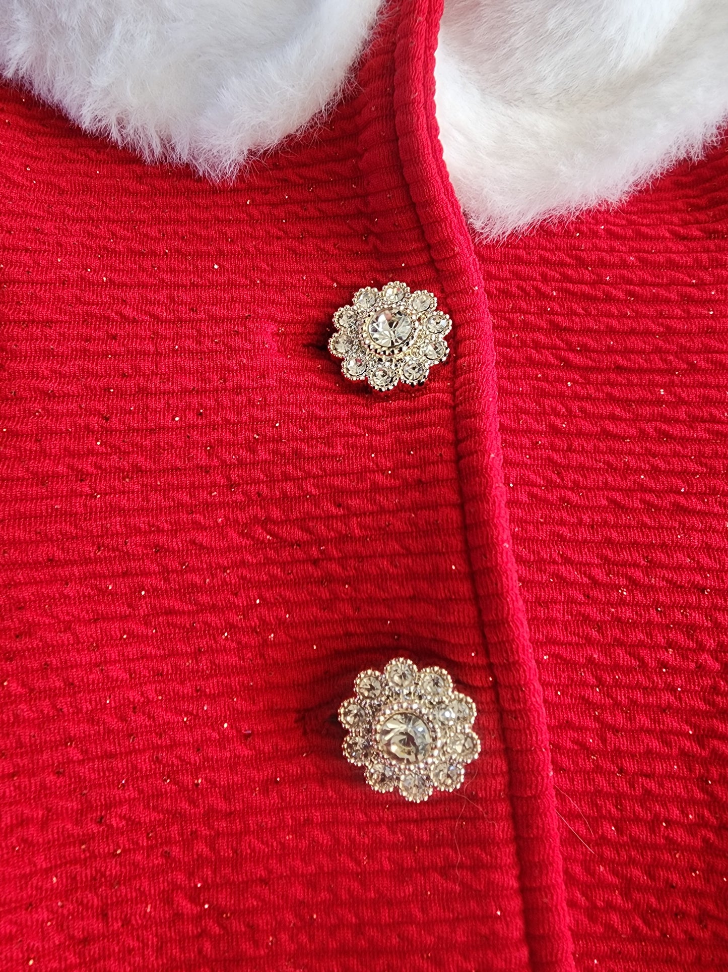 This is an adorable, festive infant girl's light coat 9 months