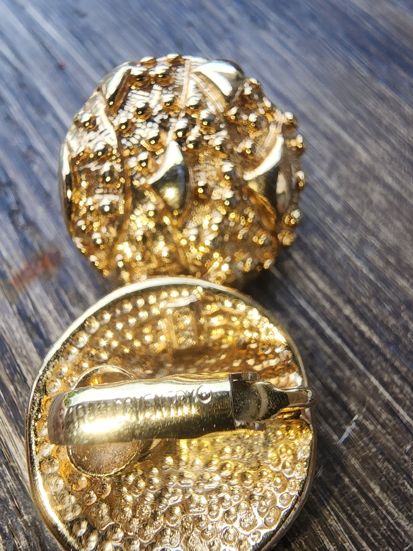 Vintage Sarah Coventry Gold Tone Textured Clip-On Earrings. Button style with a unique nugget texture. Excellent condition."