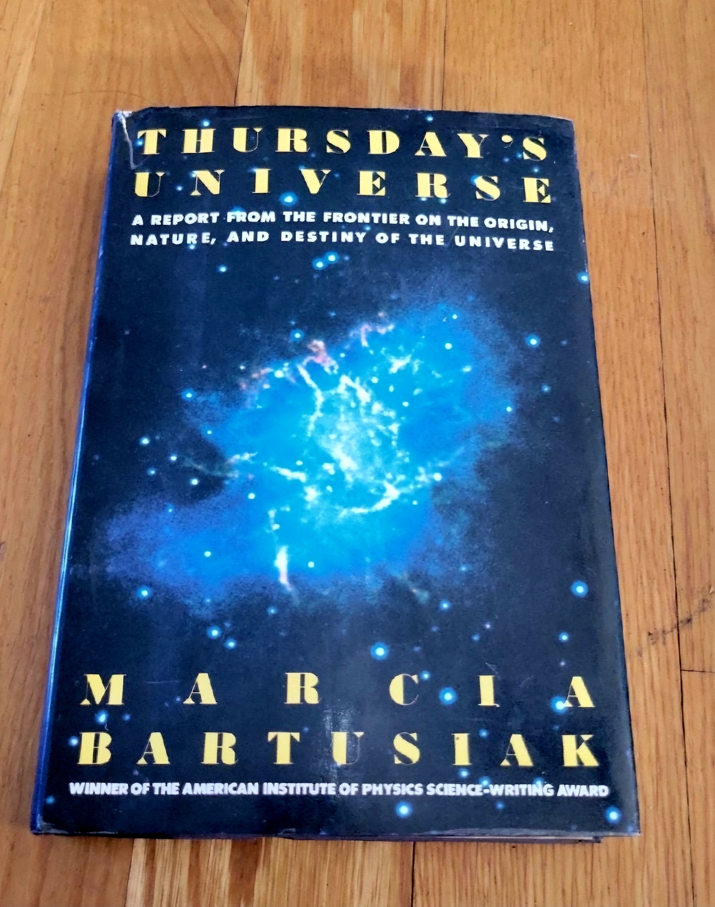 Thursdays's Universe by Marcus Bartusiak, winner of the American Institute of Physics