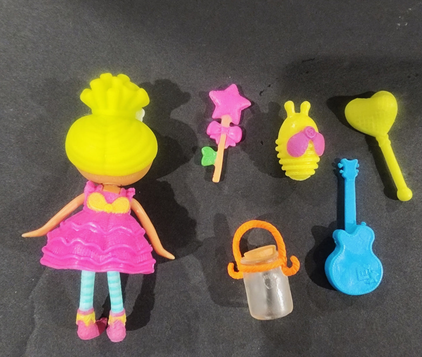 Lalaloopsy mini doll Pix E. Flutters comes with her adorable little bee and accessories 6 piece set