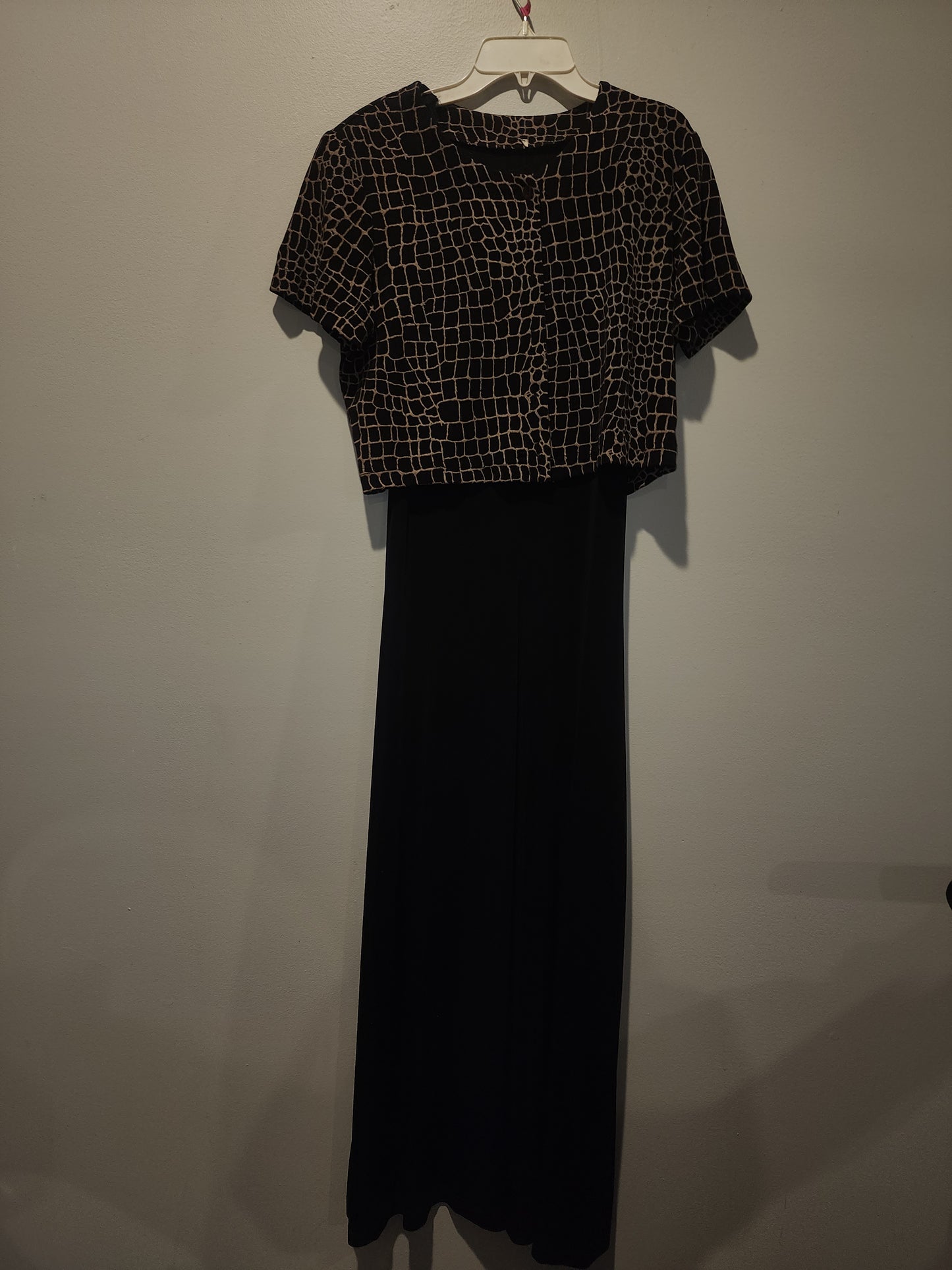 Black maxi dress paired with a short-sleeved top featuring a Giraffe Pattern M
