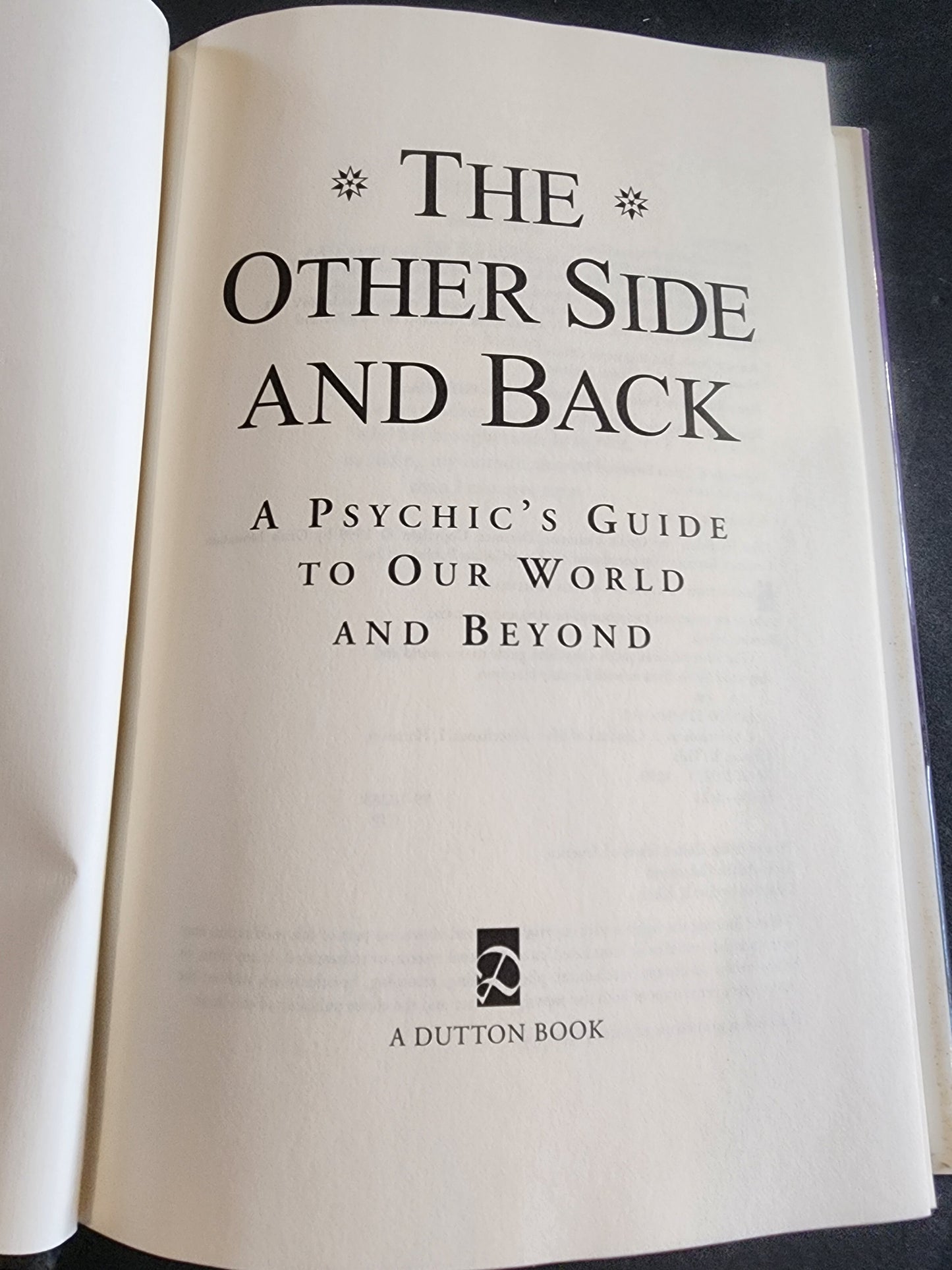 The Other Side and Back: A Psychic's Guide to Our World and Beyond" Sylvia Brown