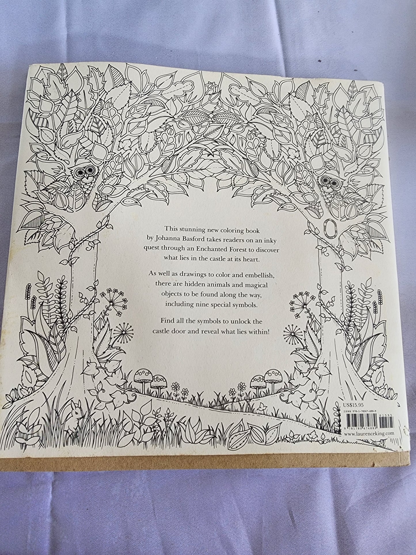 The Enchanted Forest an Inky Quest & Coloring
Book by Johanna Basford