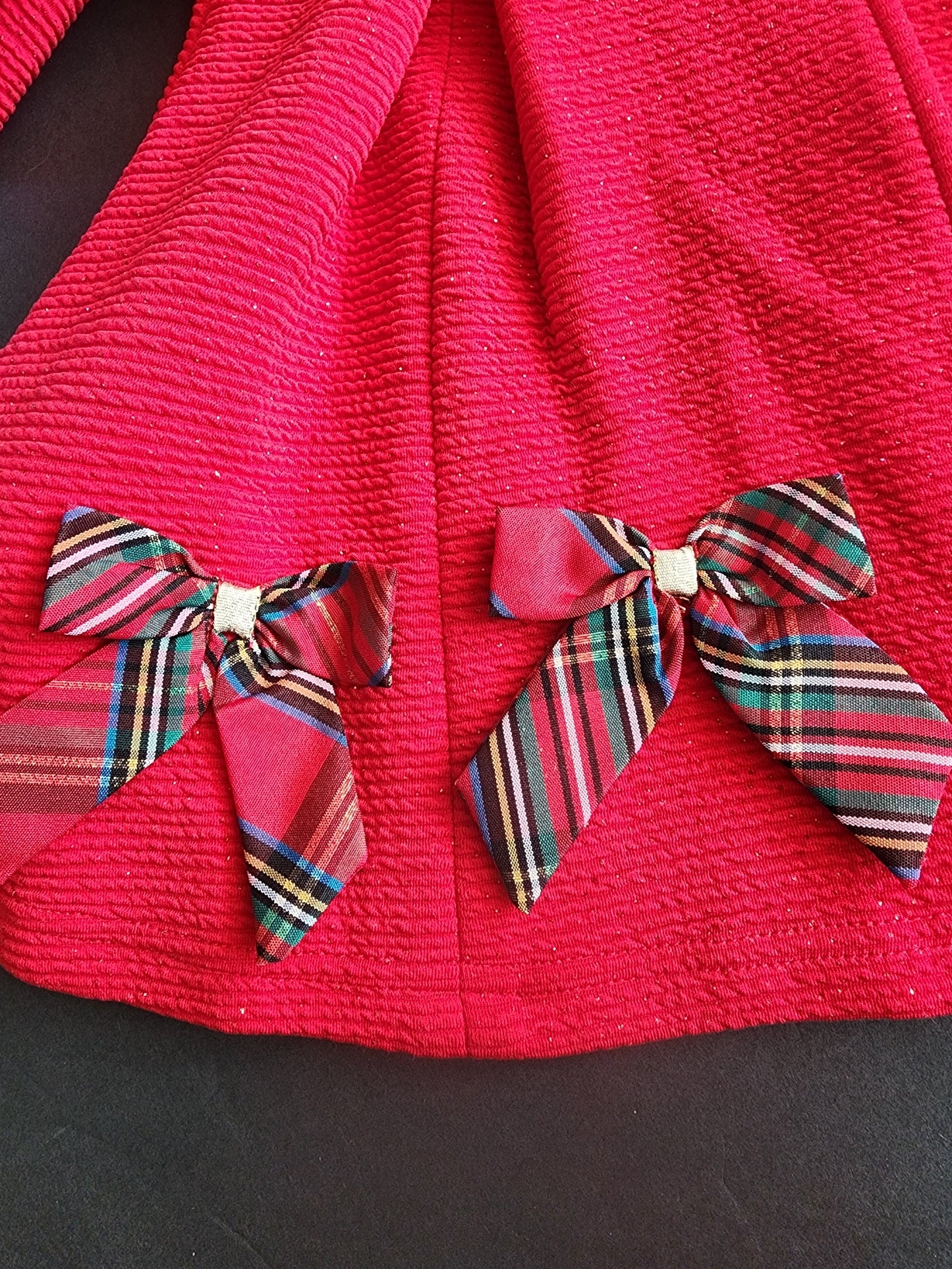 This is an adorable, festive infant girl's light coat 9 months