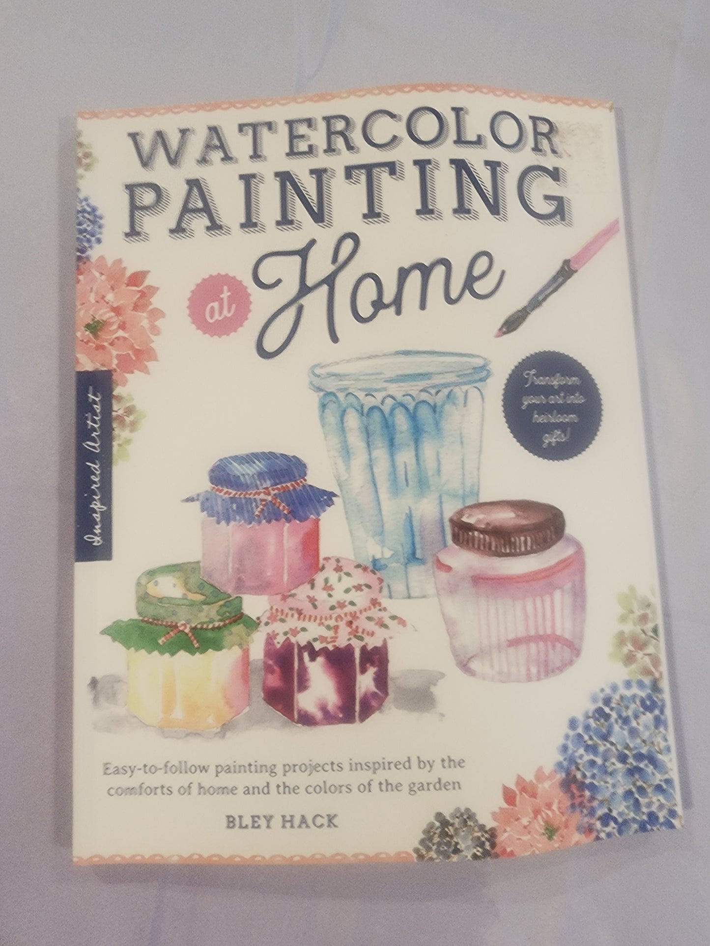 Watercolor Painting at Home: Easy-to-follow Painting Projects Inspired by the Comforts of Home and the Colors of the Garden.  Transform your art into Heirloom gifts.
Book by Bley Hack, like new