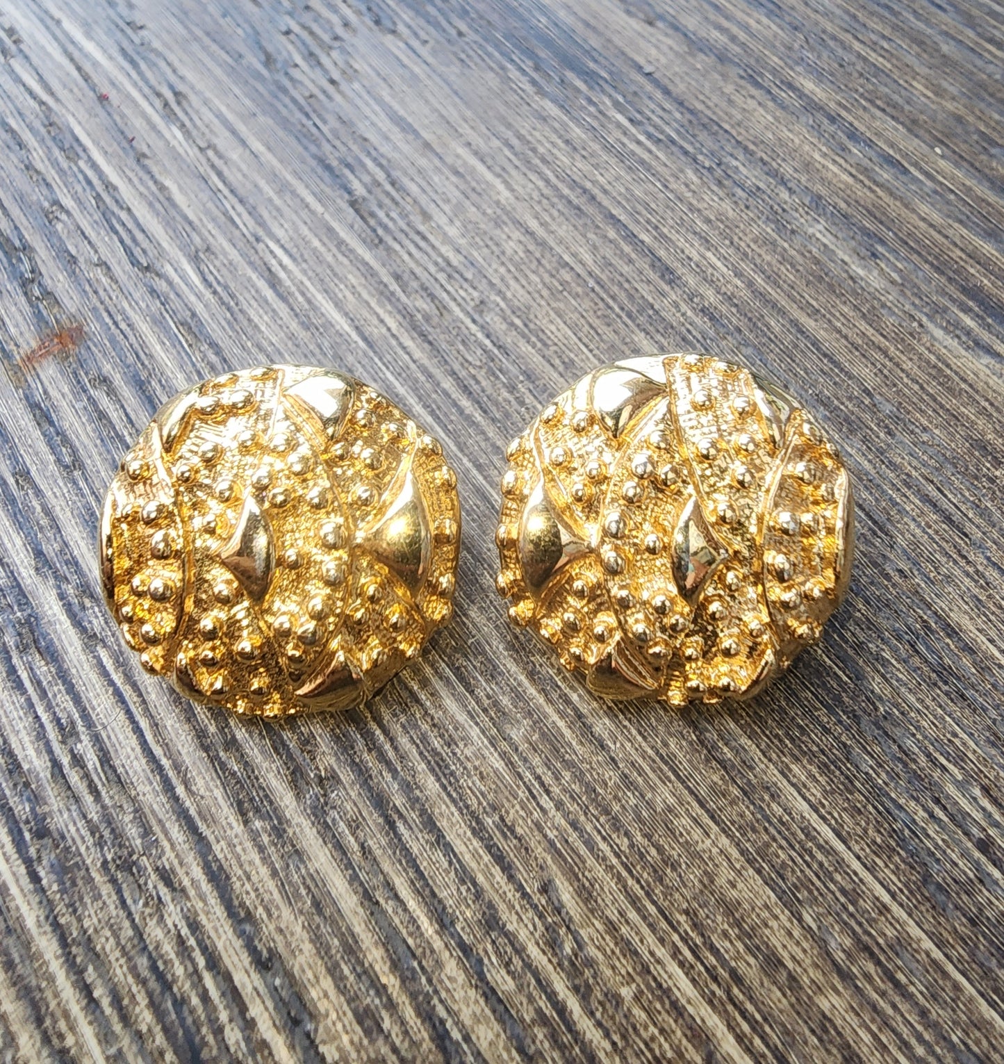Vintage Sarah Coventry Gold Tone Textured Clip-On Earrings. Button style with a unique nugget texture. Excellent condition."