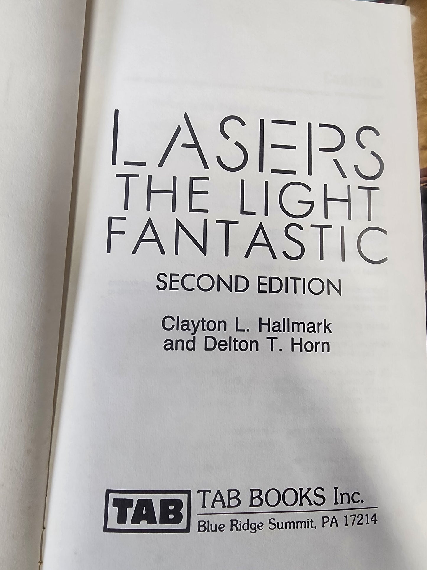 Lasers: The Light Fantastic by Clayton L. Hallmark 1987 softcover book